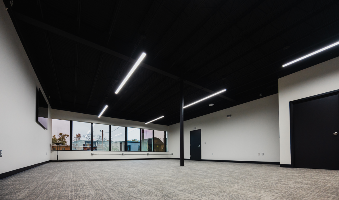The office has three floors at approximately 6,000 square feet each, comprised of private offices, dedicated desks, conference rooms and a media room. Photo courtesy of Omni Circle.