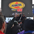 Bree Sandlin, Vice President, Shell Lubricants North America Marketing speaking in front of the crowd during Sunday's event