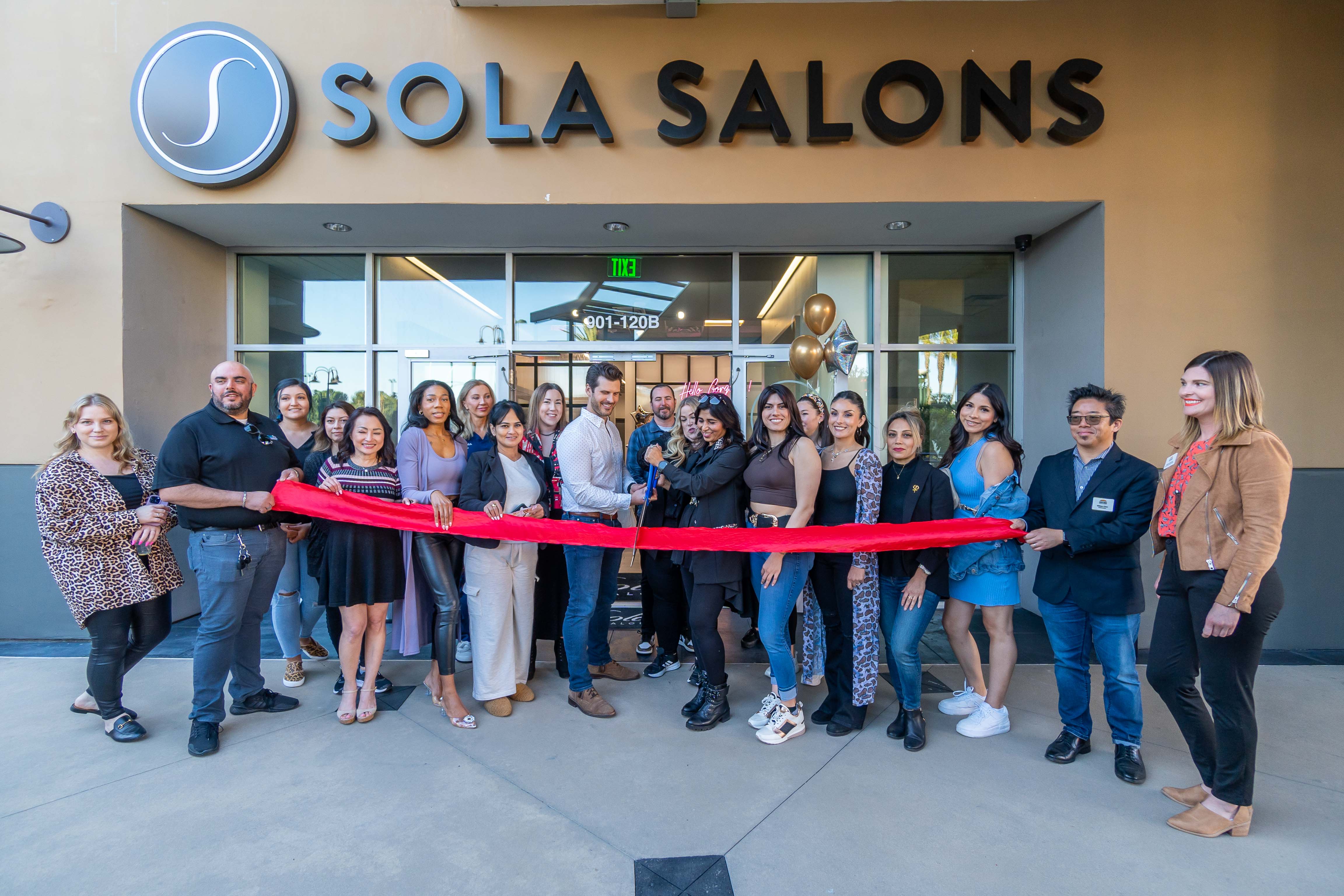 The Sola Costa Mesa at South Coast Metro Pointe team kicking off their Grand Opening celebration with a community ribbon cutting ceremony.