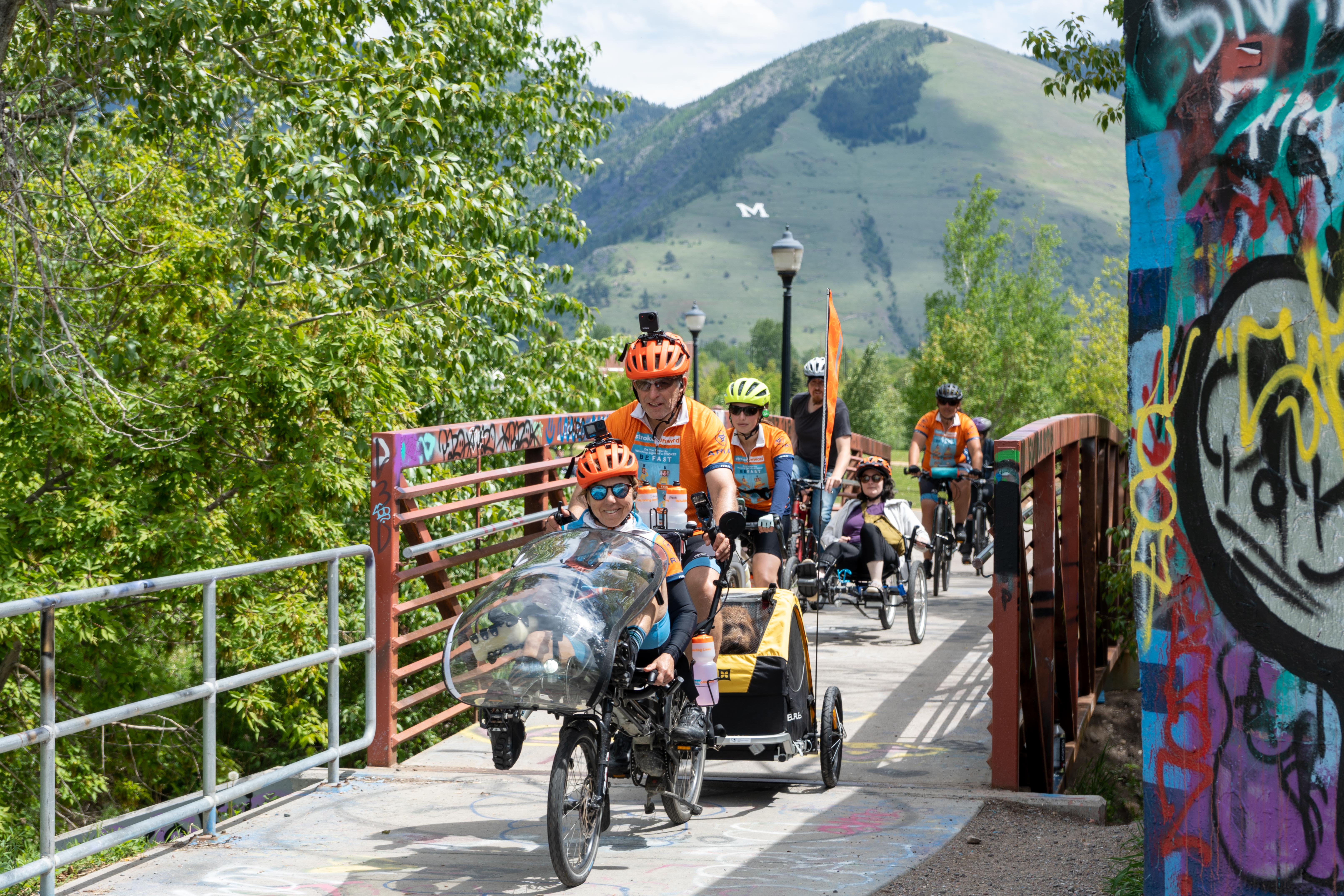Debra Meyerson and Steve Zuckerman arrive with a group of cyclists in Missoula, Montana.