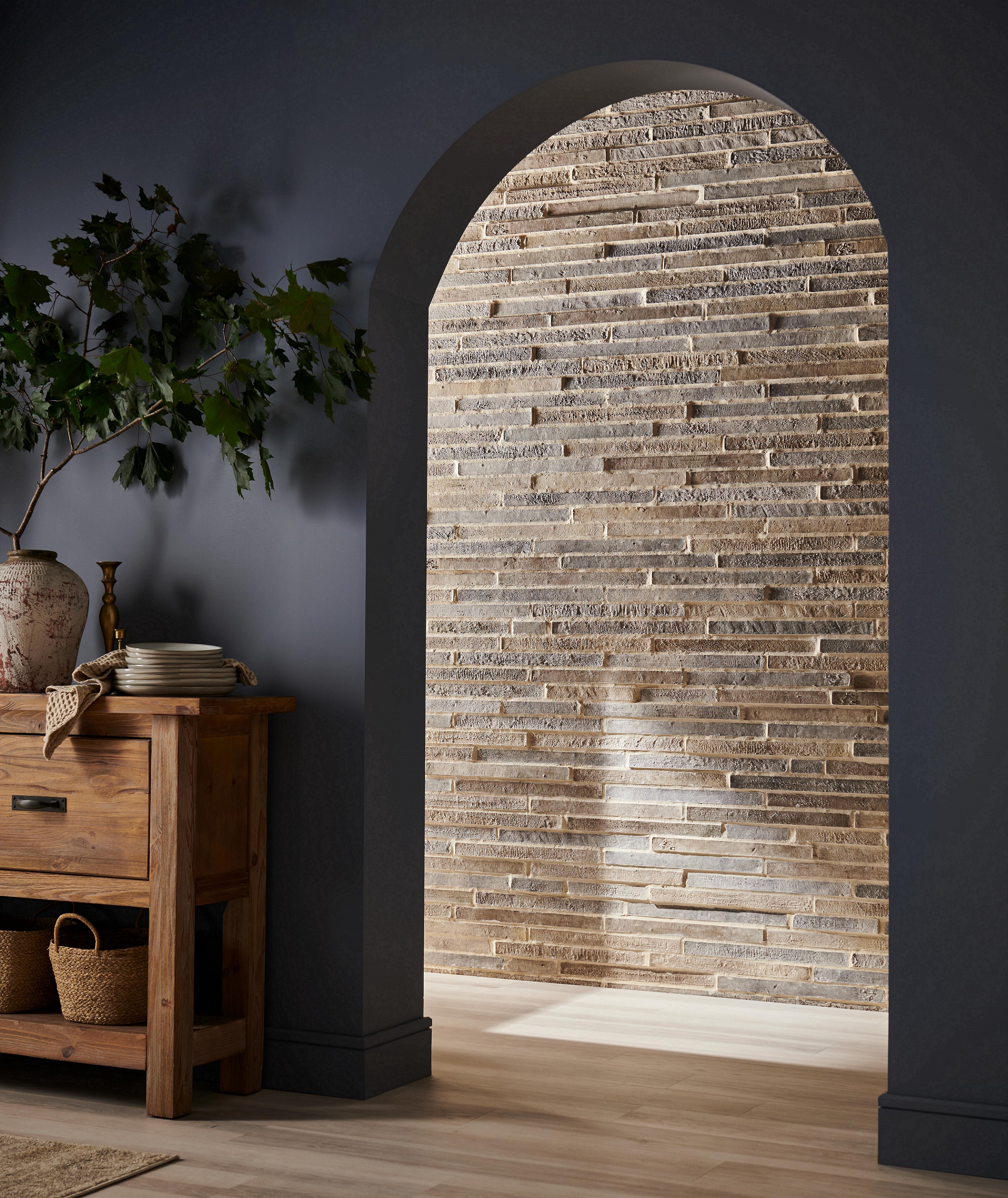 Eldorado Stone’s LoreioBrick, shown in the dimensional Farola colorway, sits at just half the height of traditional brick to anchor a modern façade on homes and buildings.