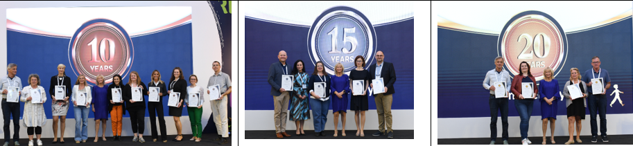 CEO Helen Doron awarding milestone award certificates