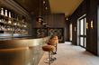 Curved brass bar with golden hues, barstools retro vibes - Interior Design by Casa Metta