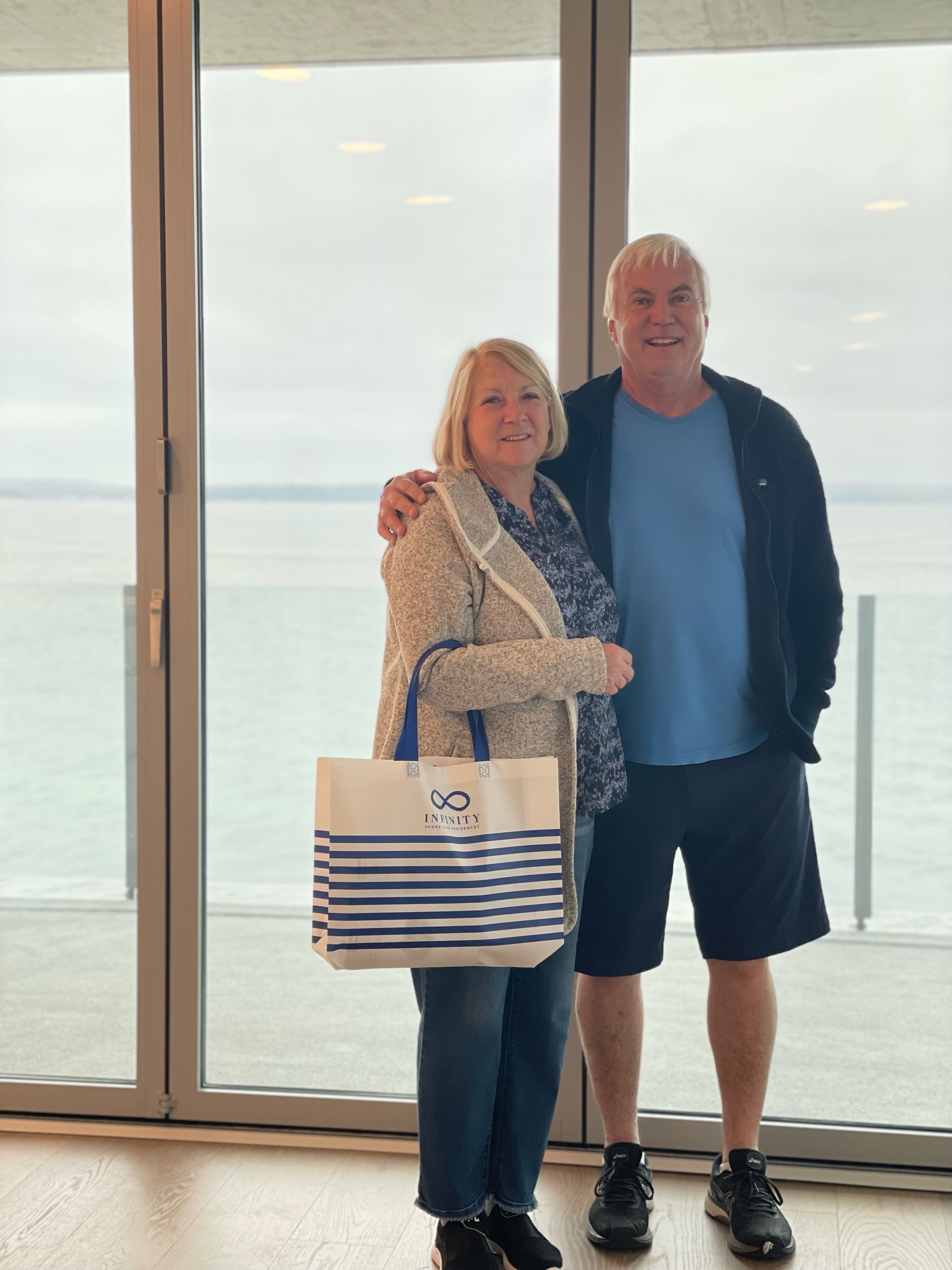 Infinity Shore Club Residences' first residents Mark and Susan Braseth look forward to enjoying the unmatched amenities, location, and design offered in the luxury beachfront building.