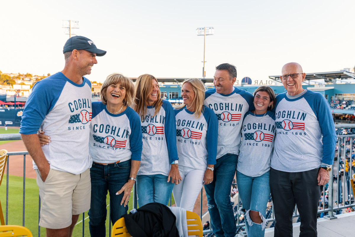 A recent event celebrating Caring Associates and their families, filled with BBQ, baseball, and enthusiastic support for the WooSox.