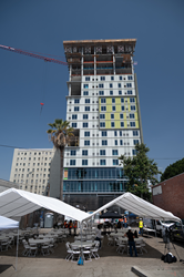 LA's Largest Development for Individuals Experiencing Homelessness Tops Out First Tower