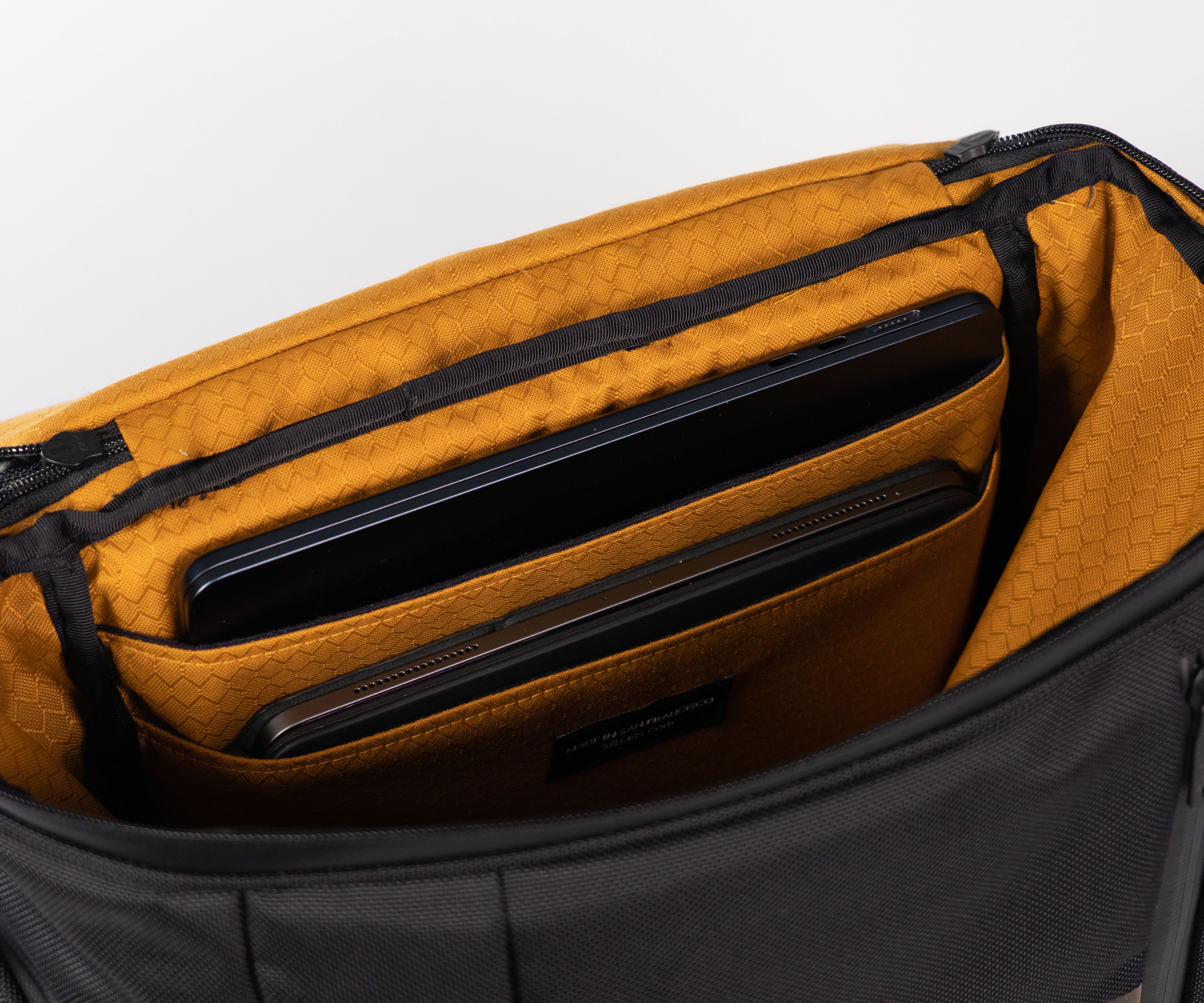 Plush laptop and tablet compartments