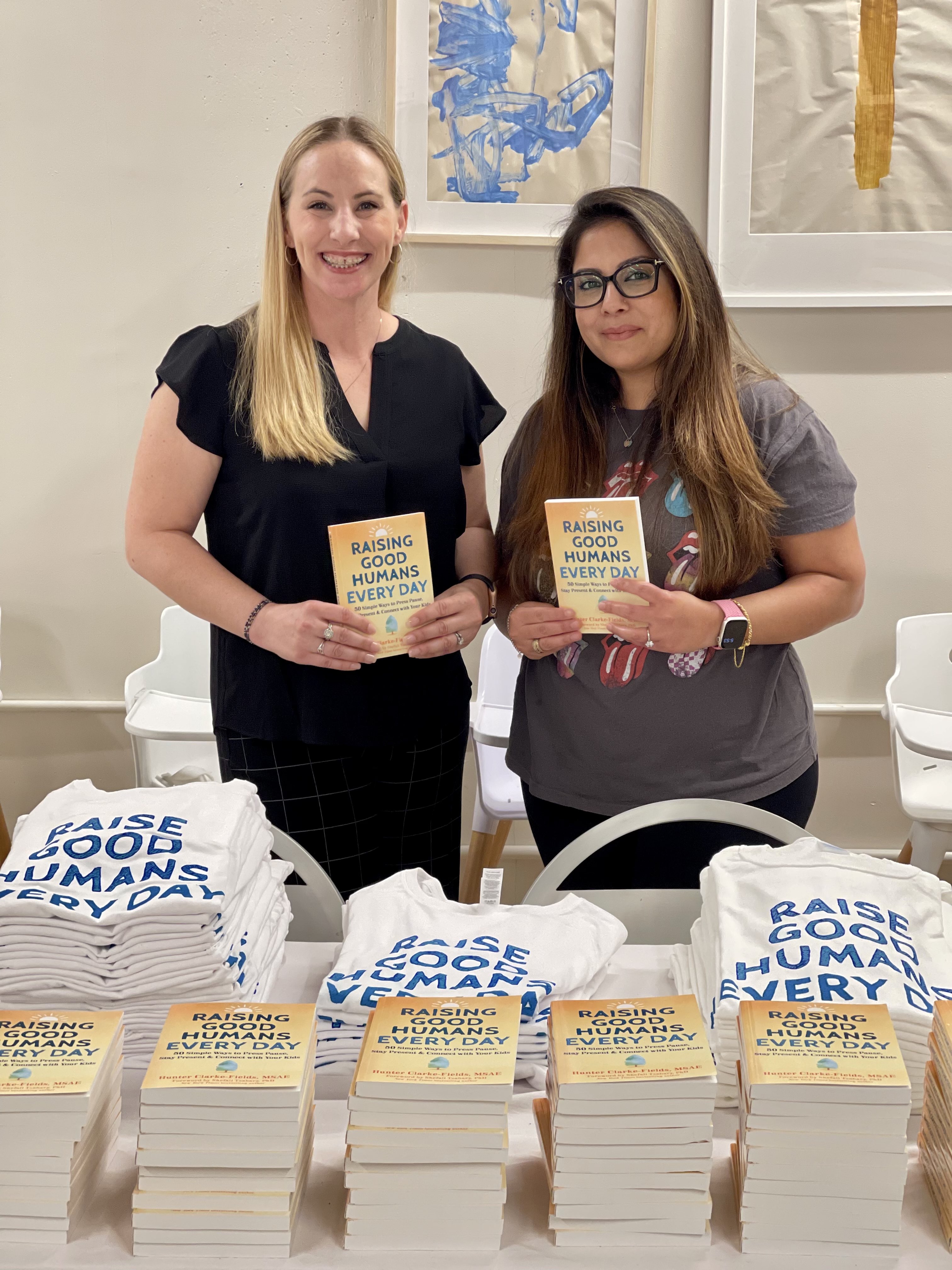 “Raising Good Humans Every Day - 50 Simple Ways to Press Pause, Stay Present and Connect with your Kids” book launch party at Cocoon NYC giveaways included autographed books and t-shirts for guests.