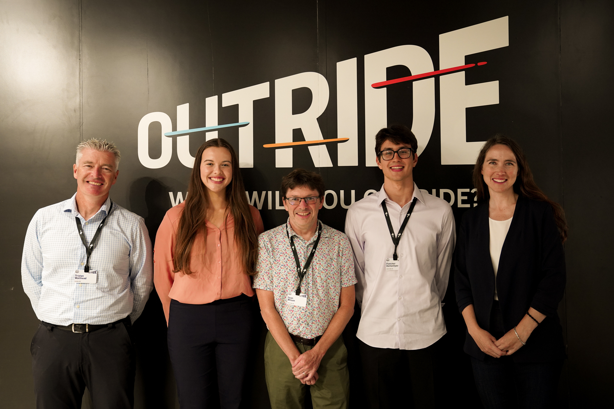 Researchers stand alongside Outride's Dr. Esther Walker at the 2023 Outride Summit