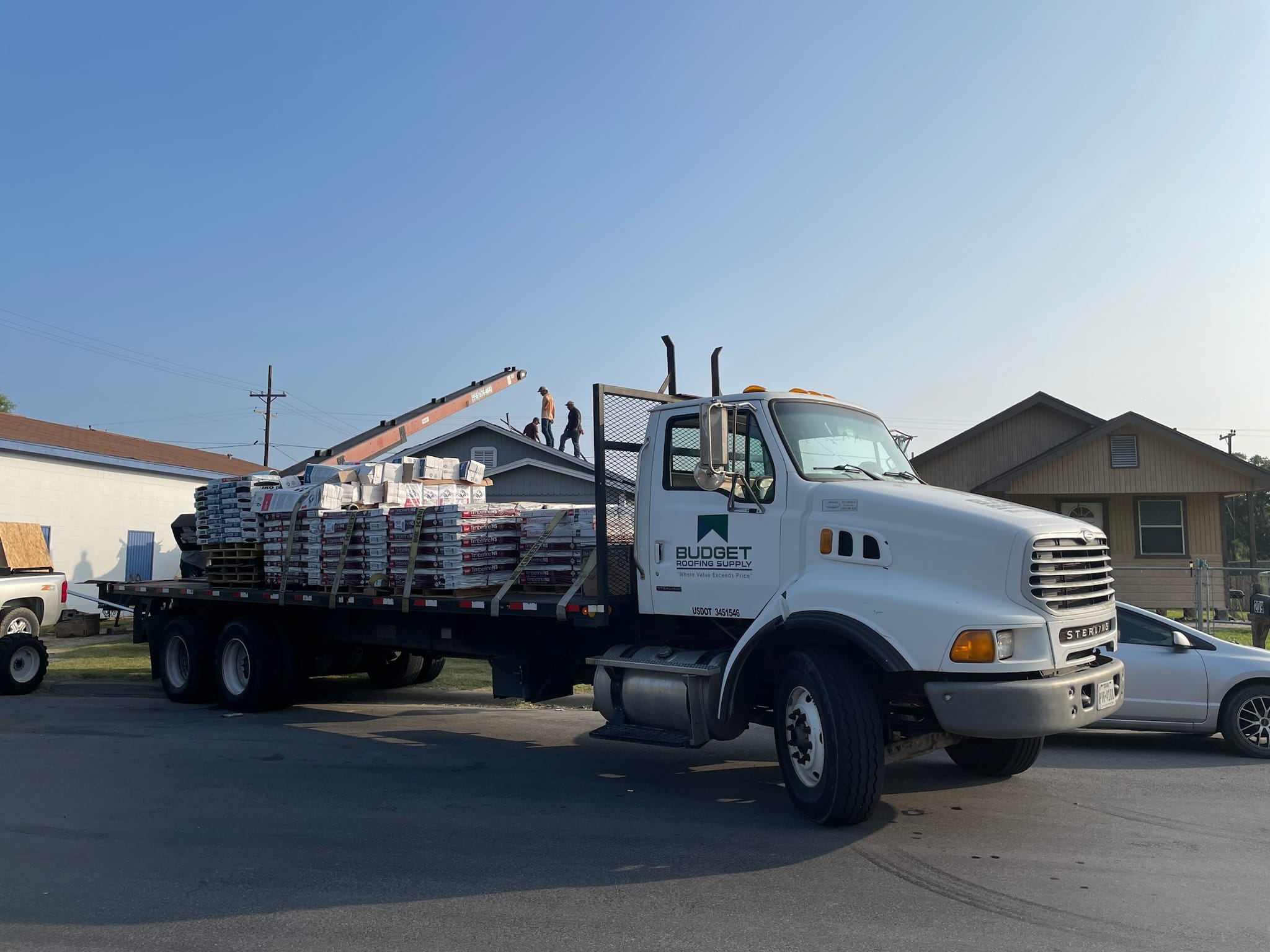 Budget Roofing Supply delivery truck.